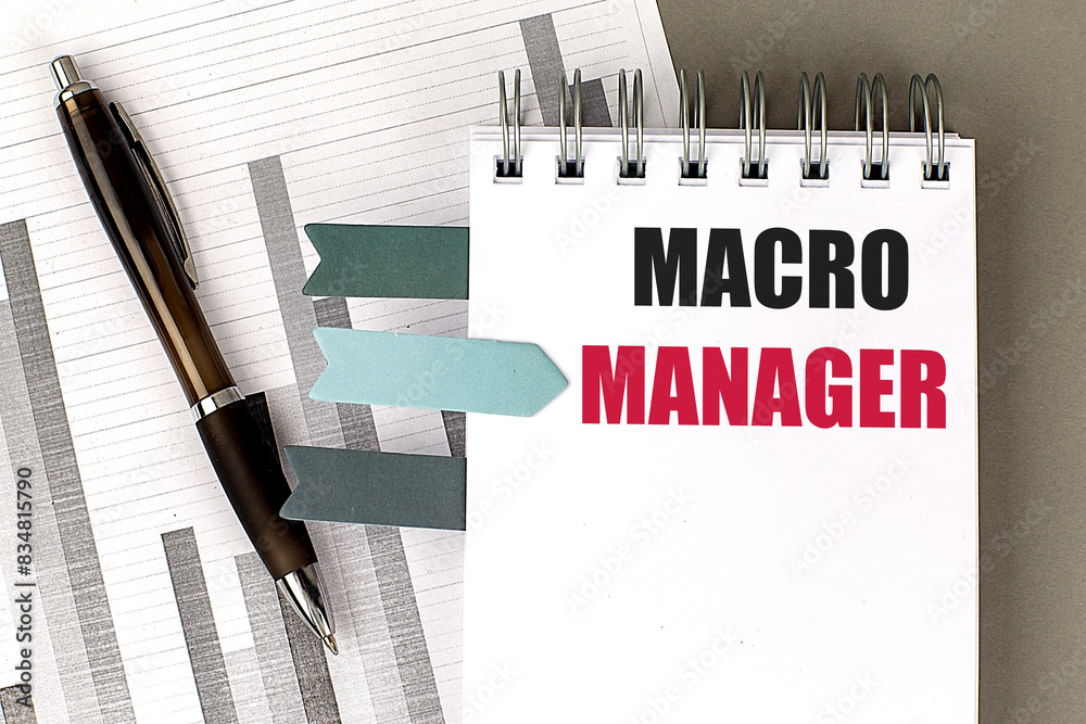 Fototapete macro manager text on notebook with chart on gray background