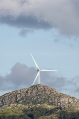 Majestic Norwegian Mountain Landscape With Big Wind Turbine.