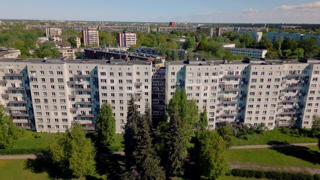 Apartment block Eastern Europe ghetto cityscape drone forward aerial