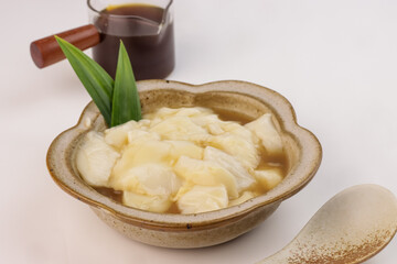 Tofu Pudding or Soy Milk Pudding or Wedang Tahu Tahwa, Served with Palm Sugar Syrup.