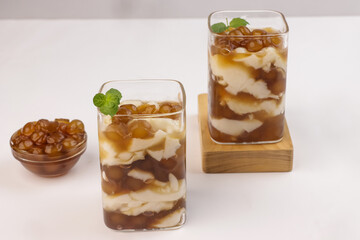 Taho is a Filipino Sweet Dessert Consisting of Silken Tofu, Simple Syrup and Tapioca Pearls.