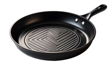 a black pan with a design on it