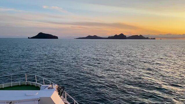 Ferry Boat Sails Towards Vestmannaeyjar At Sunset In Iceland, POV Shot