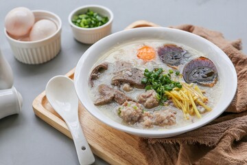 Congee or rice porridge with pork and eggs, thai food, asian food, chinese food