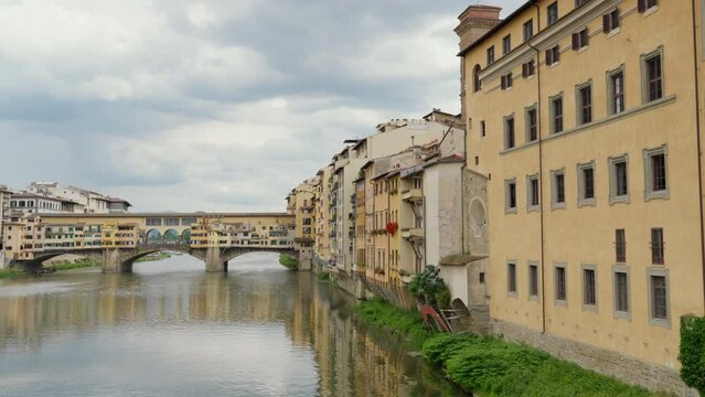 Historic Ponte Vecchio bridge over Arno River in Florence, Italy.
