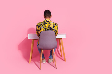 Back view photo of guy worker sit table desk isolated pastel color background