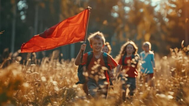 Group of children playing capture the flag At the meadow in the forest