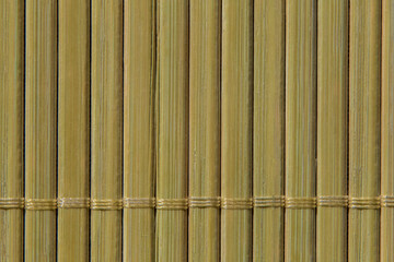 close up of napkin made of green bamboo sticks