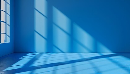 A blue background with the shadow of windows, light and shadows on the wall in a minimalist style