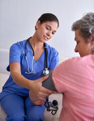 Doctor, woman and blood pressure checkup in hospital for healthcare, heart rate or hypertension...