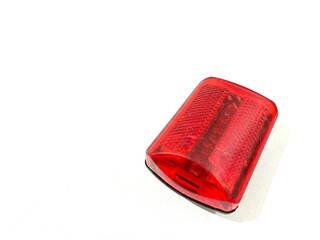Portable rear bike lamp red lighting  with reflector isolated on white background