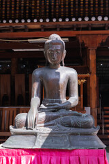 Ancient Buddha statue at Gangaramaya Temple, Colombo