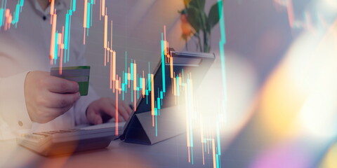 Financial trading graphs on monitor. Background with currency bars and candles