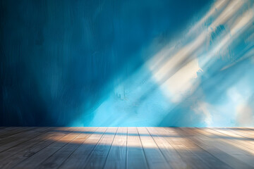 Beautiful versatile backdrop for design and product presentation with blue wall, light reflections and wooden floor.