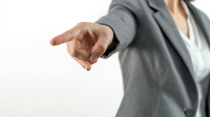 Fototapeta premium Close-Up Of Businesswoman Pointing Finger On White Background