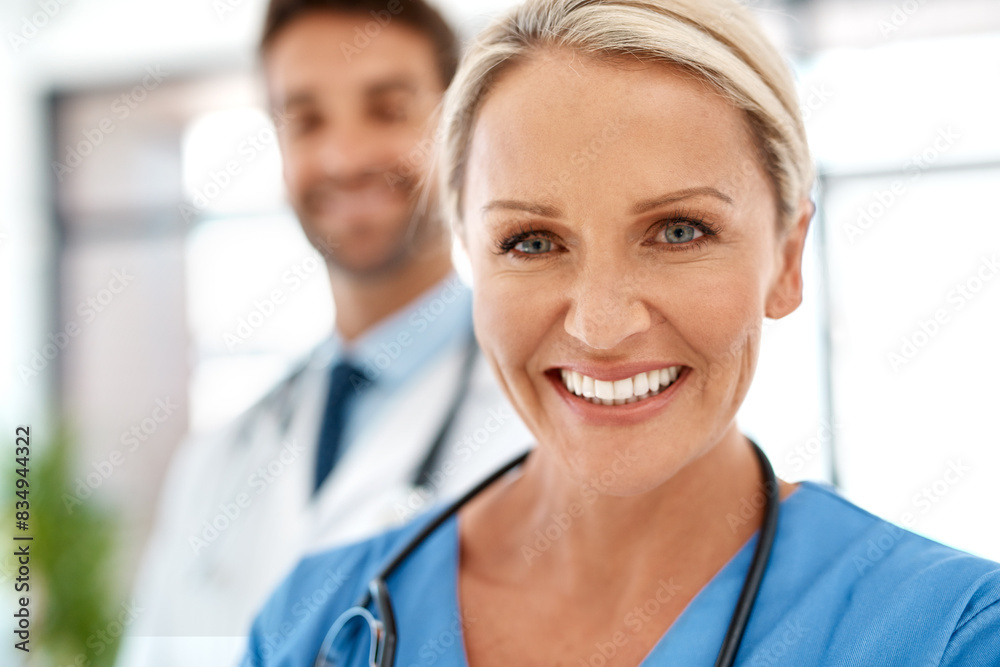 Poster Portrait, woman and happy nurse in hospital for medicine service, healthcare and coworking with team. Face, medical professional and expert surgeon, employee and doctor working at wellness clinic