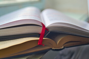 Old and new books lie open