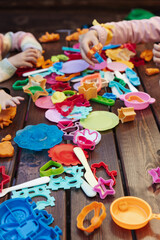 kids playing with colorful toys in the summer hands fun cheerful family kindergaten