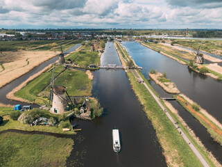 Aerial View of Windmills on Water Canal in Village Kinderdijk, The Netherlands