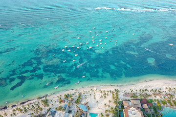 Drone photo turquoise sea with yachts. Many yachts and sailboats in sea bird's eye view. Dominicana.