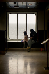 Little Family On A Ferry