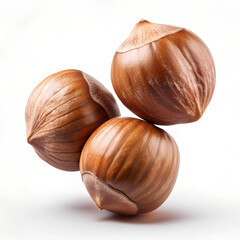 Three Whole Hazelnuts Isolated on White Background