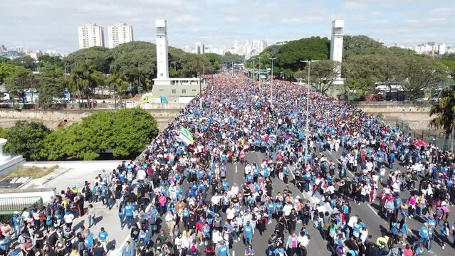 S&atilde;o Paulo, Brazil - May 30, 2024 - Home Thousands of people participate in the 32nd edition of the March for Jesus this Thursday (30), the Corpus Christi holiday, in S&atilde;o Paulo.