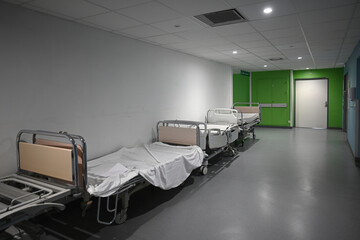 empty beds waiting for patients in a hospital