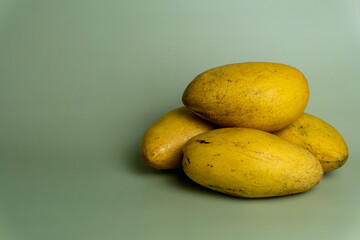 Ripe Mango Juice with Green Background