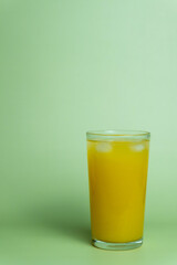Ripe Mango Juice with Green Background