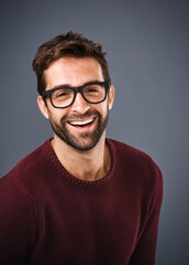 Studio, glasses and man with lens, portrait and wellness with eye care, product and frame for vision. Black background, face and happiness for person, prescription and eyewear with fashion in USA