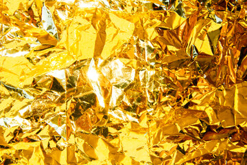 The background of crushed gold shines golden