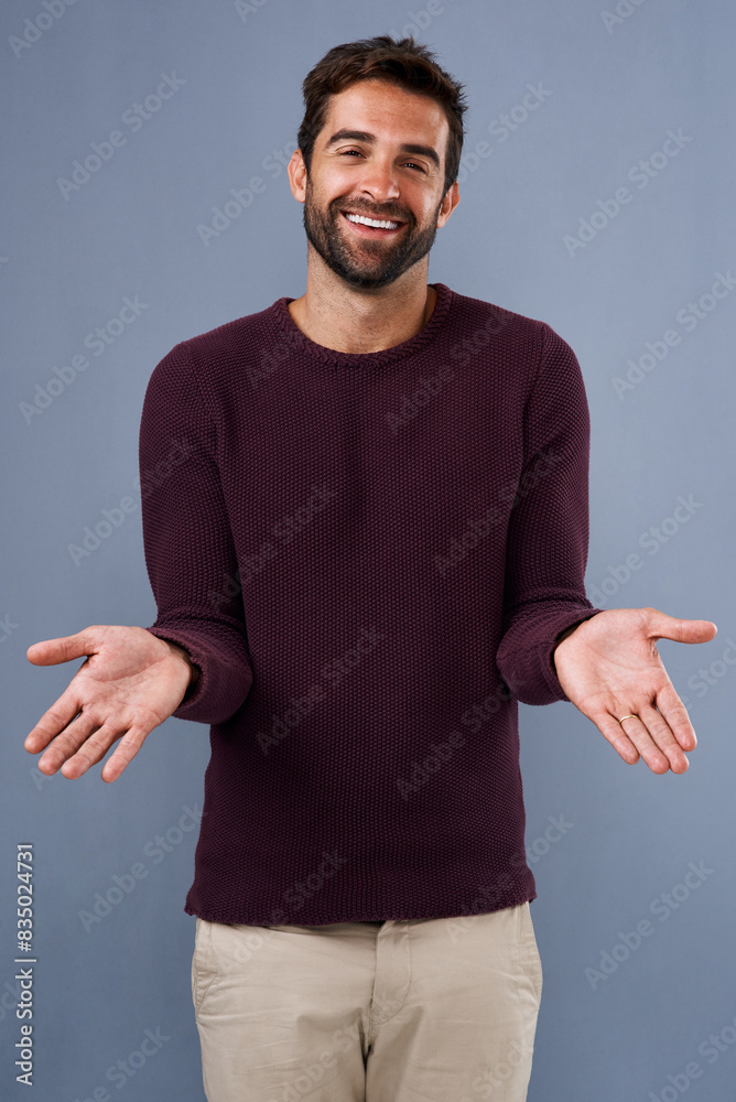 Poster studio, smile and gesture of man, question and confused with shrug, portrait and wondering of news. 