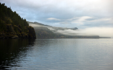 Gloomy day on sea with overcast sky and wind