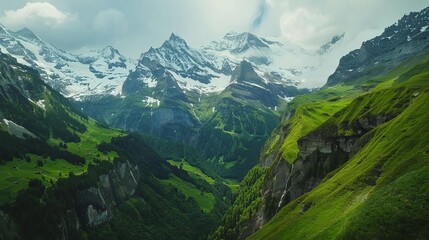 Fototapeta premium serene swiss mountain landscape with snowcapped peaks and lush green valleys idyllic alpine scenery