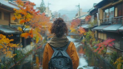 Obraz premium Experience the charm of Kyoto city through stunning visuals of an Asian female tourist exploring its timeless beauty on foot