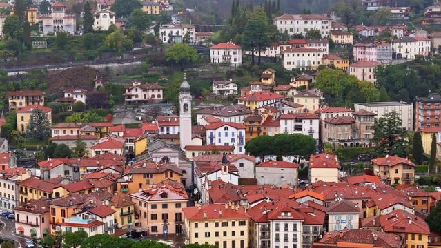 Italian Menaggio town on shore lake Como with overcast day. Aerial view
