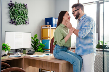 Photo of two business people in workstation office have love affair man touch chin seduce girl
