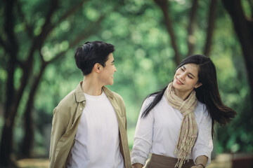 Lesbian couple sharing romantic love and care in public, celebrating joyful union as life partners.