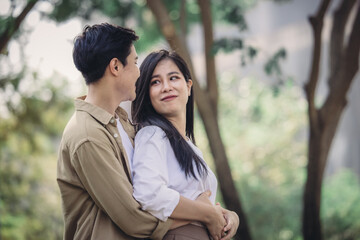 Obraz premium Lesbian couple sharing romantic love and care in public, celebrating joyful union as life partners.