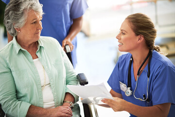 Senior woman, document and discussion with doctor in hospital, medical results or treatment for...
