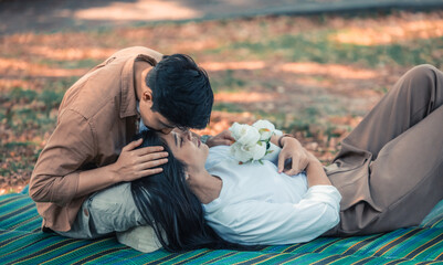 Lesbian couple sharing romantic love and care in public, celebrating joyful union as life partners.