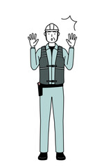 Senior male engineer in helmet and work wear raising his hand in surprise.