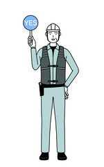 Senior male engineer in helmet and work wear holding a maru placard that shows the correct answer.