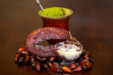 Typical Gaucho culture, yerba mate mate, red wine sago, pine nuts and rustic colonial salami