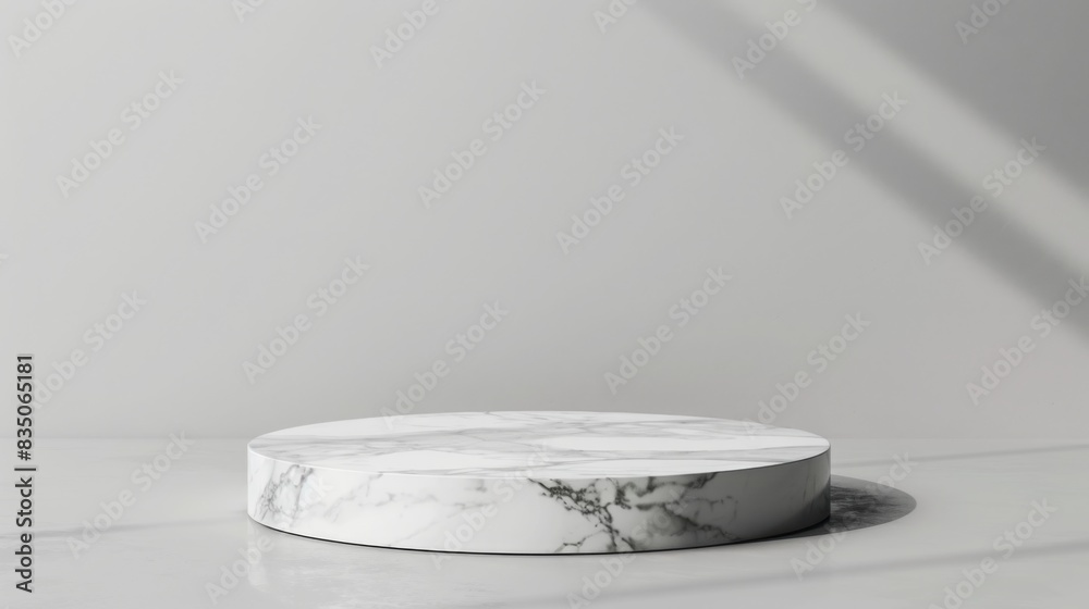 Aufkleber A round marble pedestal in a bright studio setting. Soft shadows are cast, adding depth and texture to a minimalist design.