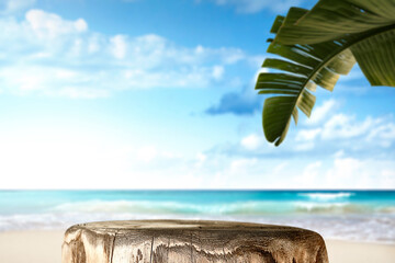 Wooden pedestal of empty space for your decoration and hot summer day. Landscape of sea and beach 