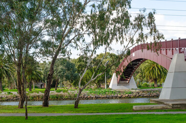Pipemaker Park footbridge over the Maribyrnong River in Melbourne, VIC, Australia. This public...