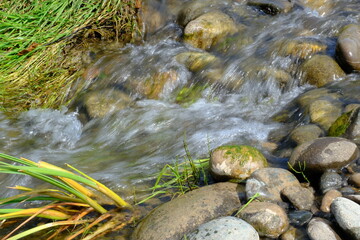 water flowing over rocks