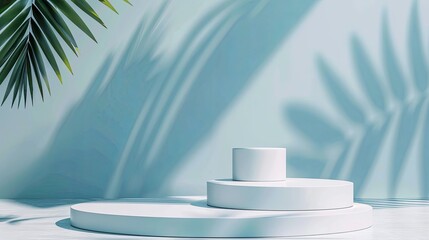 White podiums of varying heights are set against a soft blue background, accentuated by the natural shadow of a palm leaf, creating a fresh and modern display setup